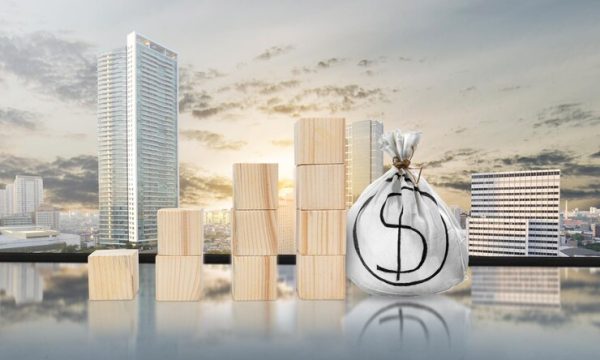 increased-wooden-block-graph-with-money-bag_9083-12999 المساعدة في ترتيب تمويل الشركات